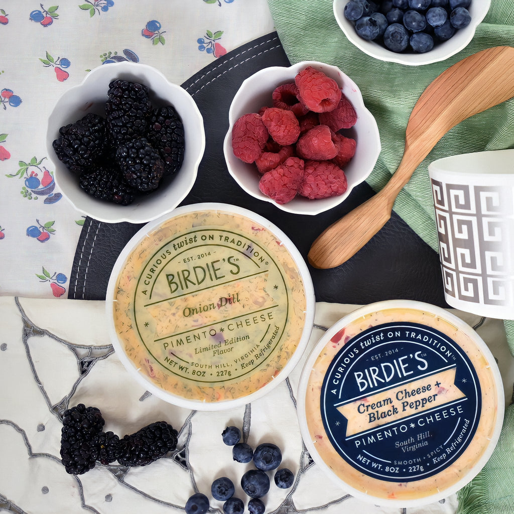 Birdie's Onion Dill pimento cheese with Cream Cheese + Black Pepper and bowls of berries